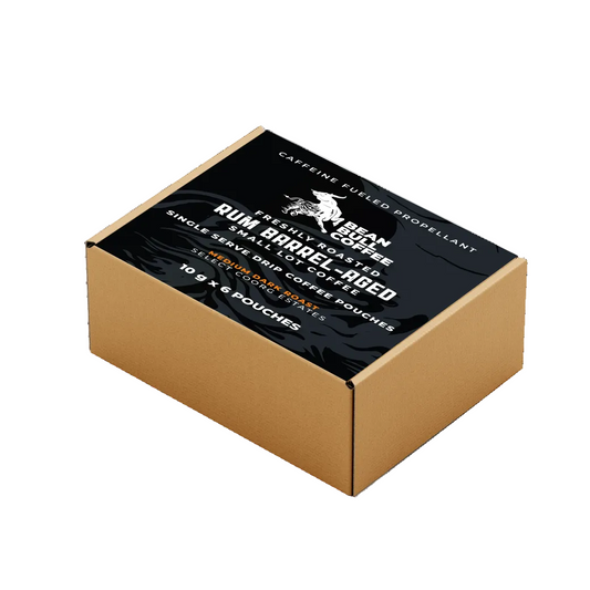Box of Rum Barrel-Aged coffee with a black label on a white background